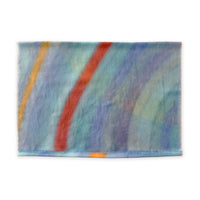 A hand-painted silk cotton scarf by Otta-Italy on a white background, measuring 70 x 190 cm, featuring 
blue, yellow, red, orange and green shades. Luxury Italian silk cotton blend accessory, soft, fresh and lightweight scarf for women and men.
