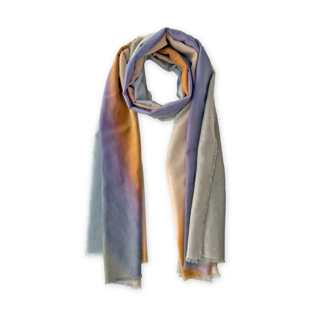 A hand-painted Otta silk cotton blend scarf on a white background, in 
gray, purple and orange shades, loosely looped to showcase its full length and delicate texture. Lightweight artisan accessory with hand-fringed edges, measuring 70 x 190 cm.
