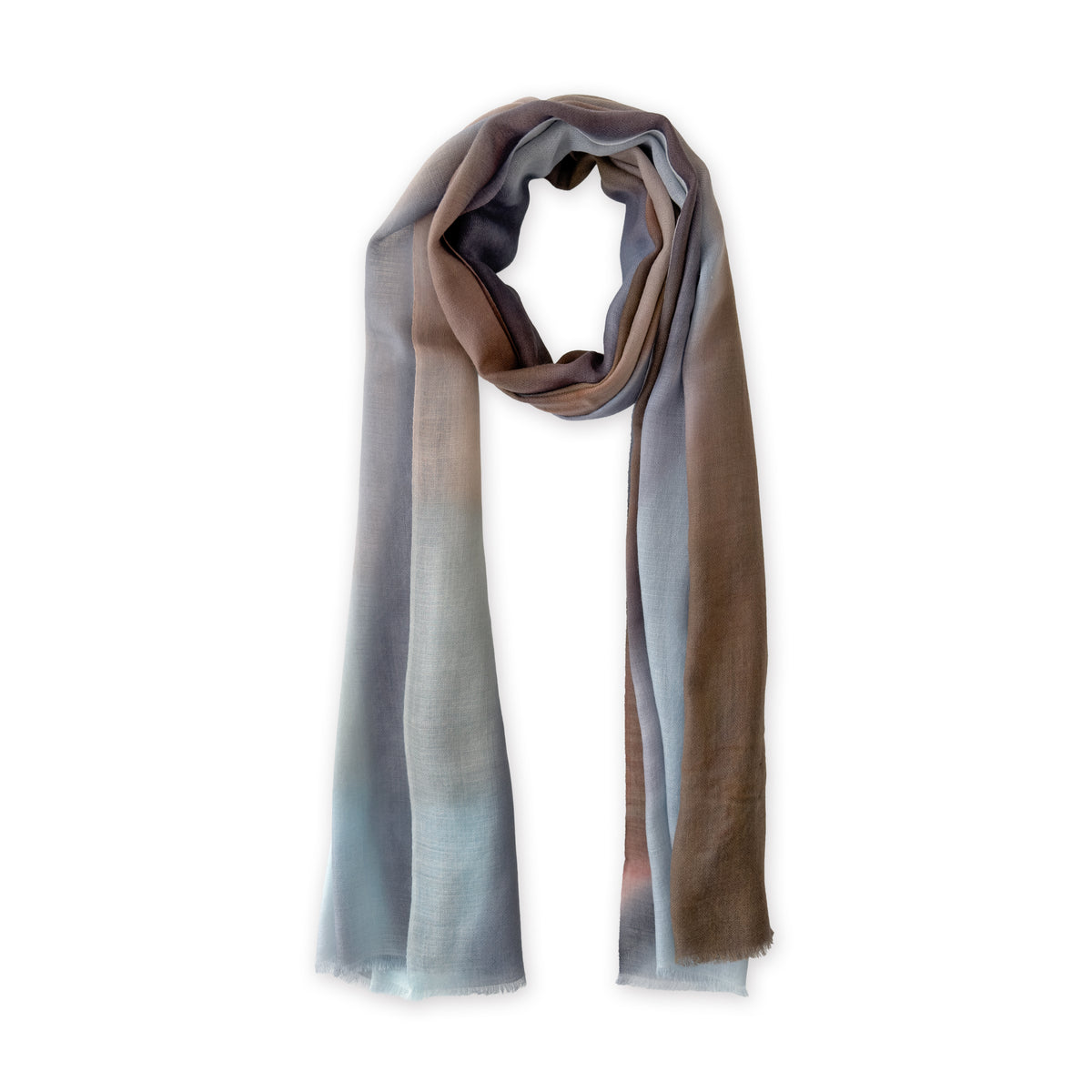 Loosely looped hand-painted Otta cashmere scarf on a white background, showcasing its warm texture and length. 67x195 cm.
