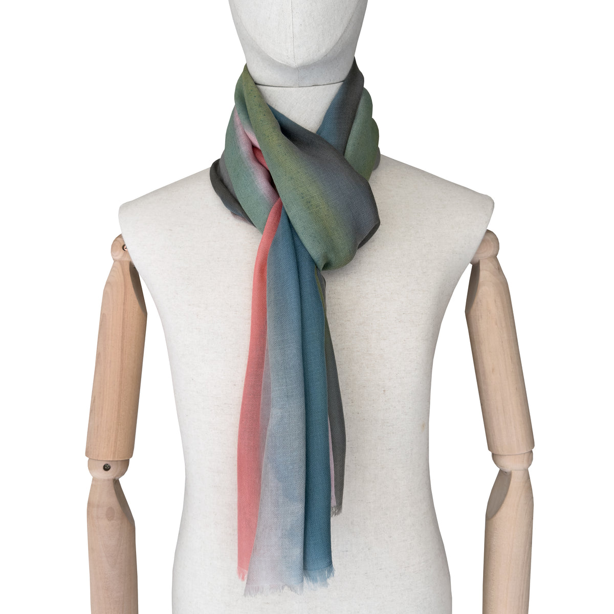 Mannequin wearing a colorful scarf on a white background. Hand-painted pure cashmere scarf by Otta-Italy, 65 x 194 cm, featuring aquamarine, pink, coral, green and grey colors. Luxury Italian cashmere accessory, soft and warm scarf for women and men
