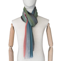 Mannequin wearing a colorful scarf on a white background. Hand-painted pure cashmere scarf by Otta-Italy, 65 x 194 cm, featuring aquamarine, pink, coral, green and grey colors. Luxury Italian cashmere accessory, soft and warm scarf for women and men
