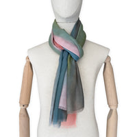 Mannequin wearing a colorful scarf on a white background. Hand-painted pure cashmere scarf by Otta-Italy, 65 x 194 cm, featuring aquamarine, pink, coral, green and grey colors. Luxury Italian cashmere accessory, soft and warm scarf for women and men
