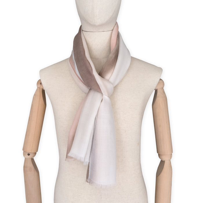 Mannequin wearing scarf on a white background. Hand-painted pure cashmere scarf by Otta-Italy, 66 x 200 cm, featuring light gray, beige, pink and brown. Luxury Italian cashmere accessory, soft and warm scarf for women and men.
