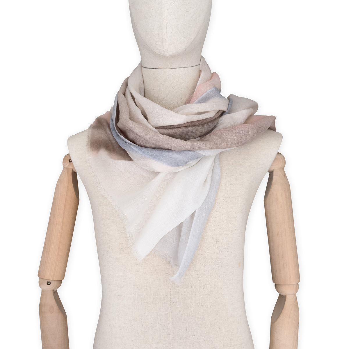 Mannequin wearing scarf on a white background. Hand-painted pure cashmere scarf by Otta-Italy, 66 x 200 cm, featuring light gray, beige, pink and brown. Luxury Italian cashmere accessory, soft and warm scarf for women and men.
