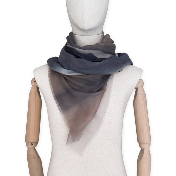 Mannequin wearing scarf on a white background. Hand-painted pure cashmere scarf by Otta-Italy, 67 x 200 cm, featuring dark gray and brown. Luxury Italian cashmere accessory, soft and warm scarf for women and men.
