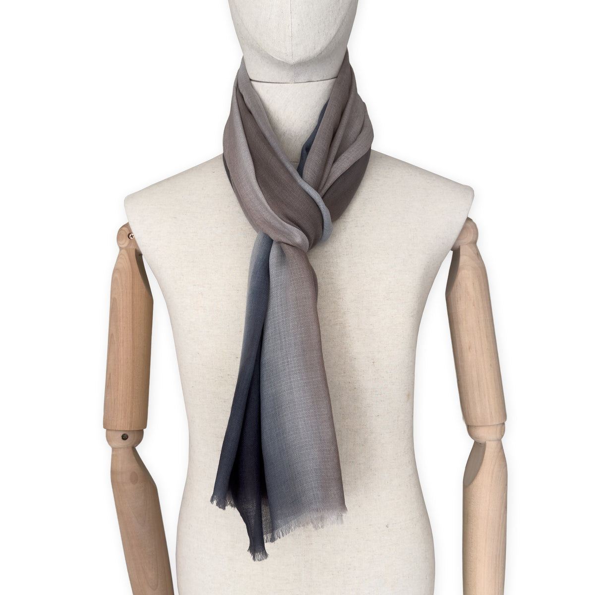 Mannequin wearing scarf on a white background. Hand-painted pure cashmere scarf by Otta-Italy, 67 x 200 cm, featuring dark gray and brown. Luxury Italian cashmere accessory, soft and warm scarf for women and men.
