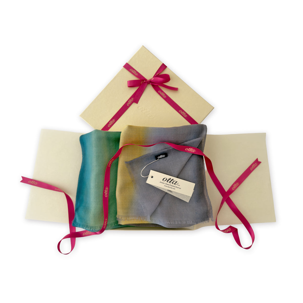Set of scarves in a gift box with a pink ribbon on a white background. 
Hand-painted cashmere scarf by Otta-Italy, 68 x 202 cm, featuring 
green, yellow, gray and brown. Luxury Italian pure cashmere accessory, soft and warm scarf for women and men.

