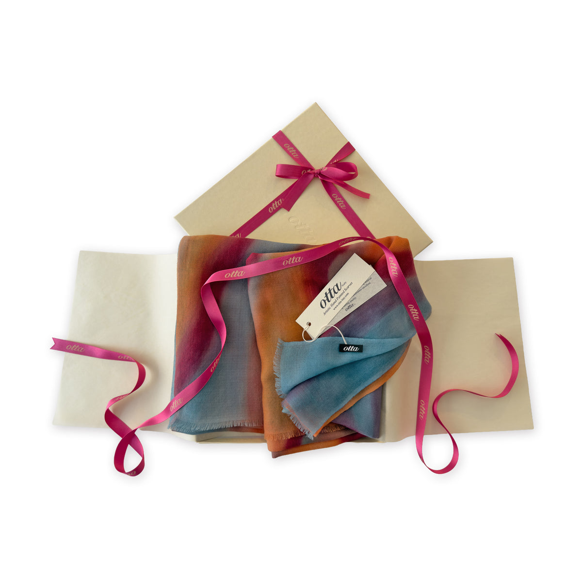 Set of scarves in a gift box with a pink ribbon on a white background. 
Hand-painted cashmere scarf by Otta-Italy, 69 x 201 cm, featuring 
orange, red and blue. Luxury Italian pure cashmere accessory, soft and warm scarf for women and men.
