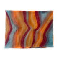 Colorful scarf on a white background. Hand-painted cashmere scarf by Otta-Italy, 69 x 201 cm, featuring 
orange, red and blue. Luxury Italian pure cashmere accessory, soft and warm scarf for women and men.
