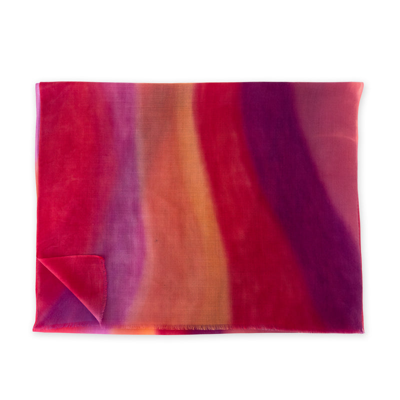 Multicolored cashmere scarf on a white background. Hand-painted cashmere scarf by Otta-Italy, 66 x 200 cm, featuringred, fuchsia and orange shades of colors. Luxury Italian cashmere, soft and warm scarf for women and men.
