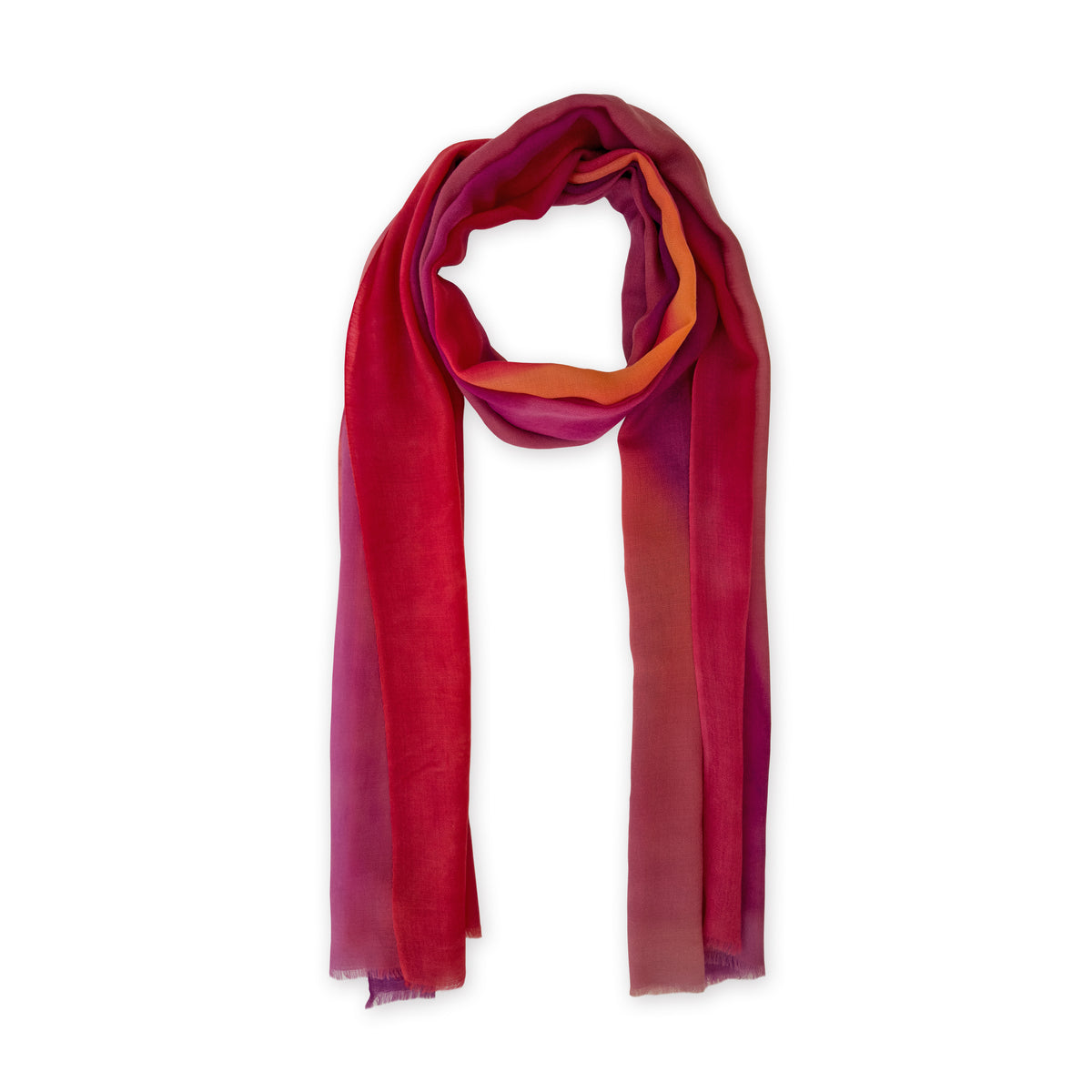 Colorful cashmere scarf in red, fuchsia and orange shades on a white background. t is hand-painted scarf in measures 66 x 200 cm by otta-italy scarves brand. Luxury Italian cashmere accessory, soft and warm scarf for women and men.
