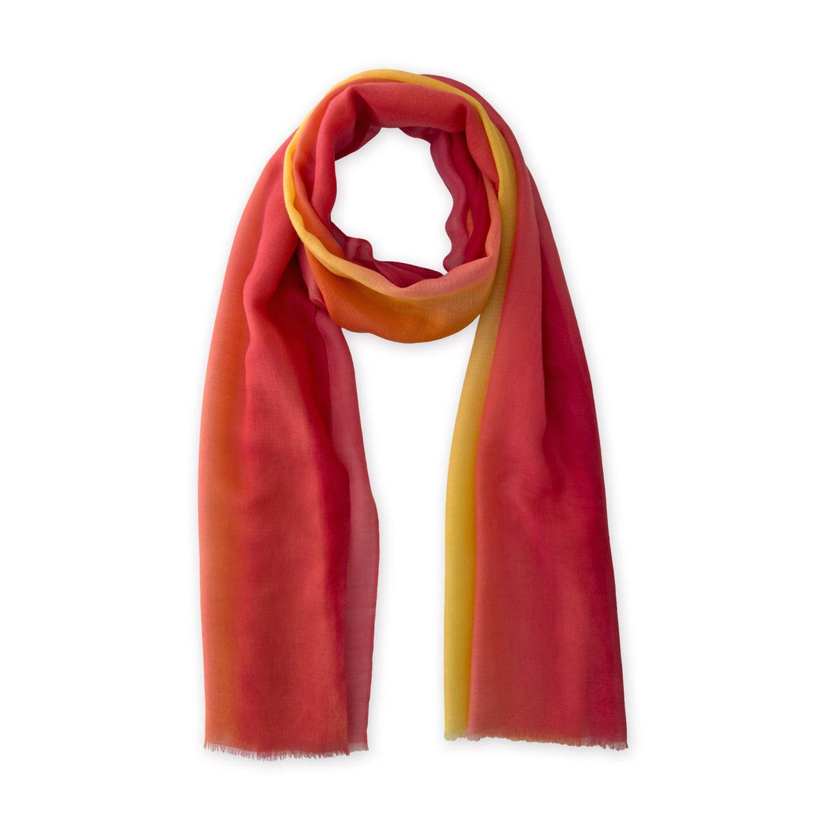Loosely looped hand-painted Otta cashmere scarf on a white background, showcasing its warm texture and length. 69 x 200 cm.
