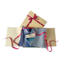 Set of scarves in a gift box with a pink ribbon on a white background. 
Hand-painted linen scarf by Otta-Italy, 32 x 200 cm, featuring blue, midnight blue, light blue, turquoise and indigo colors. Luxury Italian linen scarf, soft and lightweight scarf for women and men.
