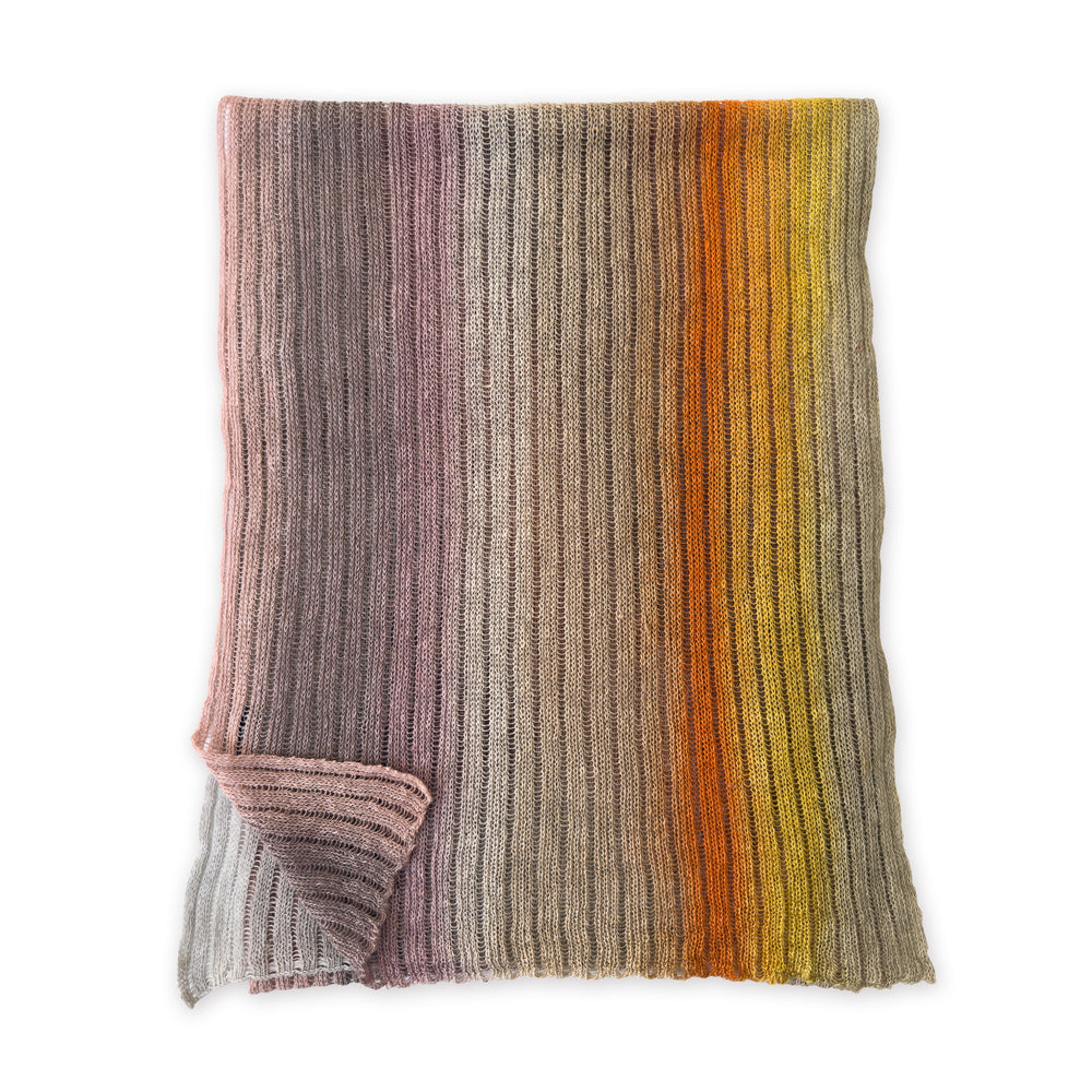 Knitted blanket with multicolor stripes on a white background. linen-scarf-hand-painted-28x192cm-brown-pastel pink-orange-yellow-otta-italy
