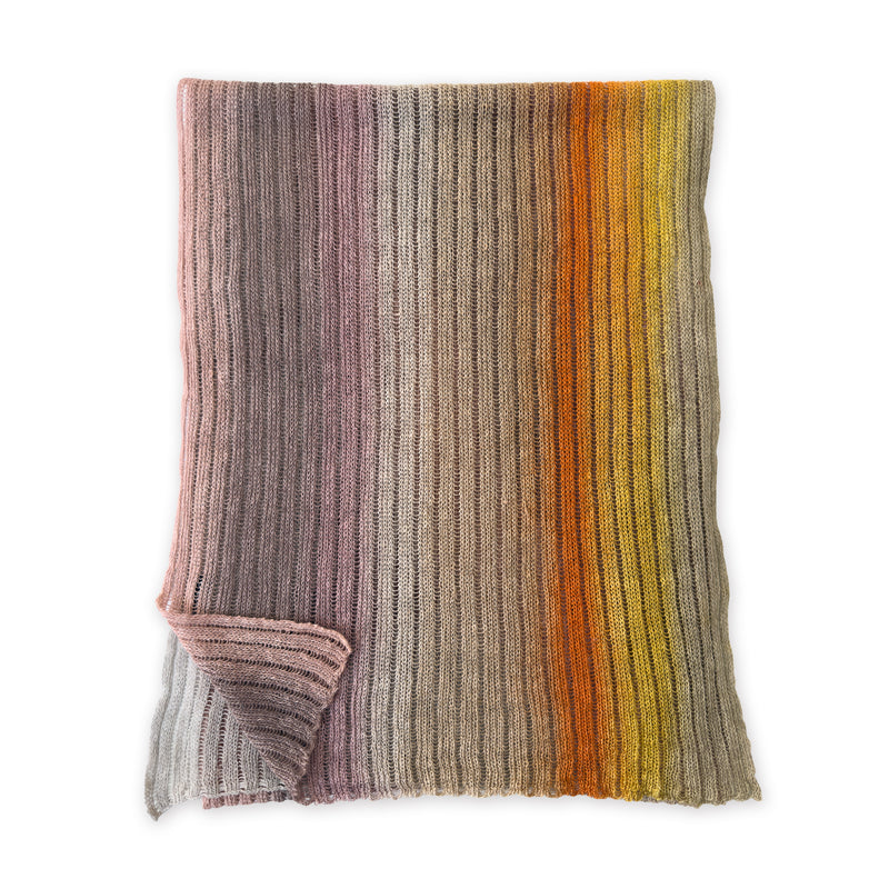 Knitted blanket with multicolor stripes on a white background. linen-scarf-hand-painted-28x192cm-brown-pastel pink-orange-yellow-otta-italy

