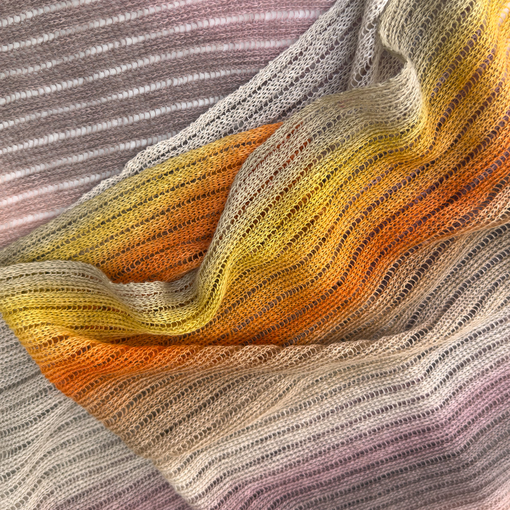 Knitted fabric with a gradient of colors.linen-scarf-hand-painted-28x192cm-brown-pastel pink-orange-yellow-otta-italy
