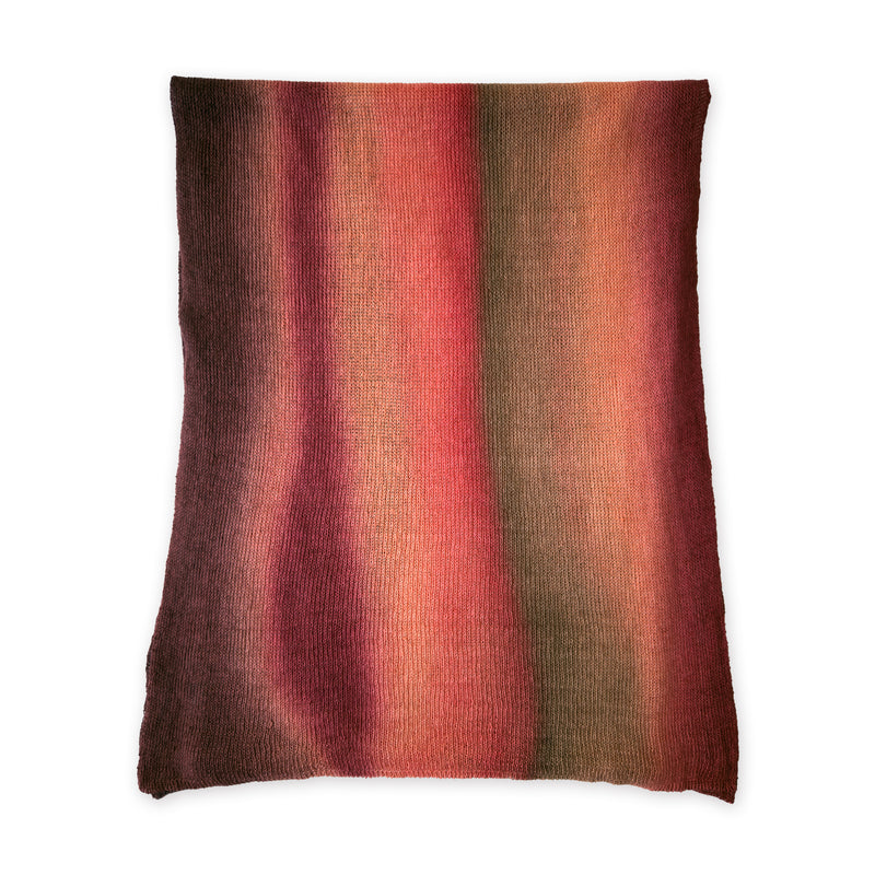 Colorful linen scarf in red, coral and brown shades on a white background. t is hand-painted scarf in measures 32 x 200 cm by otta-italy scarves brand. Luxury Italian linen accessory, soft and lightweight scarf for women and men.
