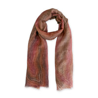 Hand-painted Otta pure linen scarf in 
brown and red, loosely looped to showcase its full length and delicate texture in white background. Lightweight artisan accessory with hand-sewn edges, measuring 203 x 50 cm.
