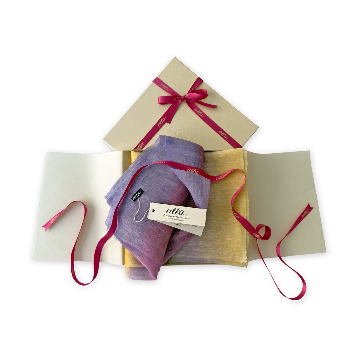 Set of scarves in a gift box with a pink ribbon on a white background. 
Hand-painted linen scarf by Otta-Italy, 52 x 200 cm, featuring 
yellow, purple and lilac. Luxury Italian pure linen accessory, soft, fresh and lightweight scarf for women and men.
