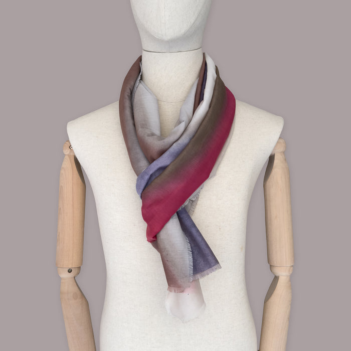 Mannequin wearing scarf on a gray background. Hand-painted silk cotton scarf by Otta-Italy, measuring 70 x 190 cm, featuring 
brown, beige, red and purple shades. Luxury Italian pure silk cotton blend accessory, soft, fresh and lightweight scarf for women and men.
