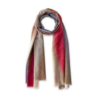 A hand-painted Otta silk cotton blend scarf on a white background, in 
brown, beige, red and purple shades, loosely looped to showcase its full length and delicate texture. Lightweight artisan accessory with hand-fringed edges, measuring 70 x 190 cm.
