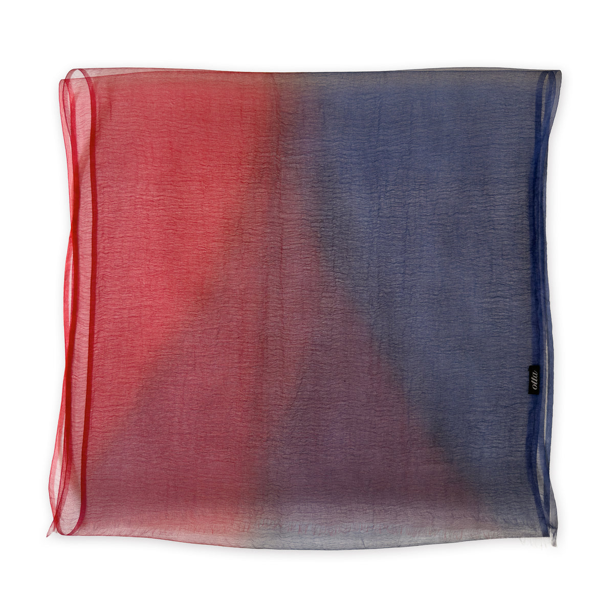 Colorful silk scarf in red and blue shades on a white background. t is hand-painted scarf in measures 48 x 194 cm by otta-italy scarves brand. Luxury Italian silk accessory, soft and lightweight scarf for women and men.
