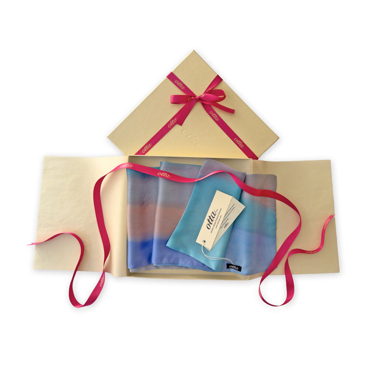 Set of scarves in a gift box with a pink ribbon on a white background. 
Hand-painted silk scarf by Otta-Italy, 45 x 180 cm, featuring 
indigo, turquoise, sky blue, gray and peach. Luxury Italian pure silk accessory, soft and lightweight scarf for women and men.
