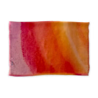 A hand-painted silk scarf by Otta-Italy on a white background, measuring 65 x 175 cm, featuring 
red, orange, fuchsia and yellow shades. Luxury Italian pure silk accessory, soft, fresh and lightweight scarf for women and men.
