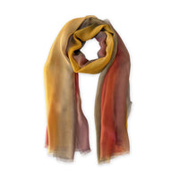 Multicolored silk scarf on a white background. Hand-painted silk scarf by Otta-Italy, 176 x 64 cm, featuring red, orange, yellow and brown shades of colors. Luxury Italian silk, soft and lightweight scarf for women and men.

