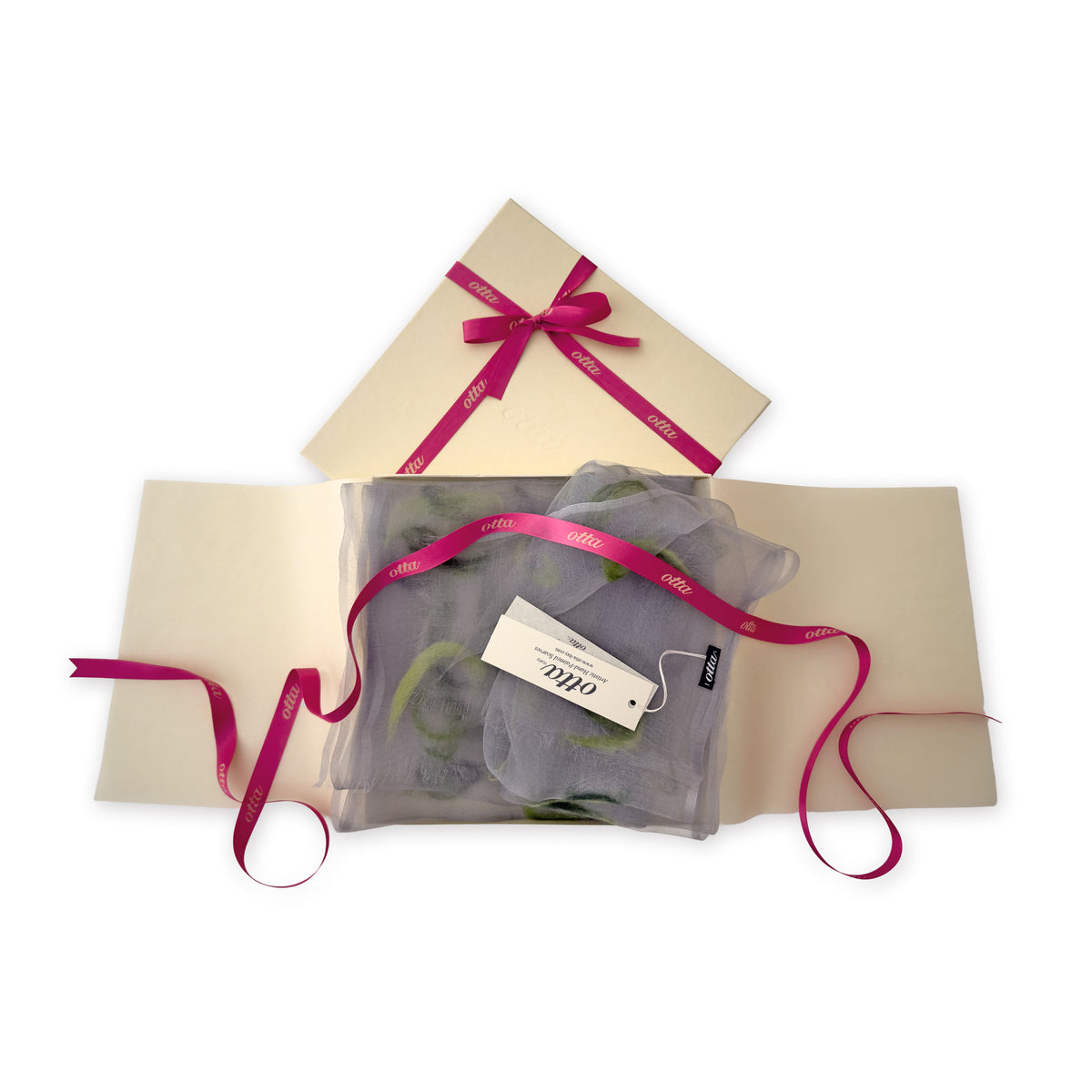  Luxury gift box with a pink ribbon containing a hand-painted Otta-Italy silk organza and wool felted scarf on a white background.