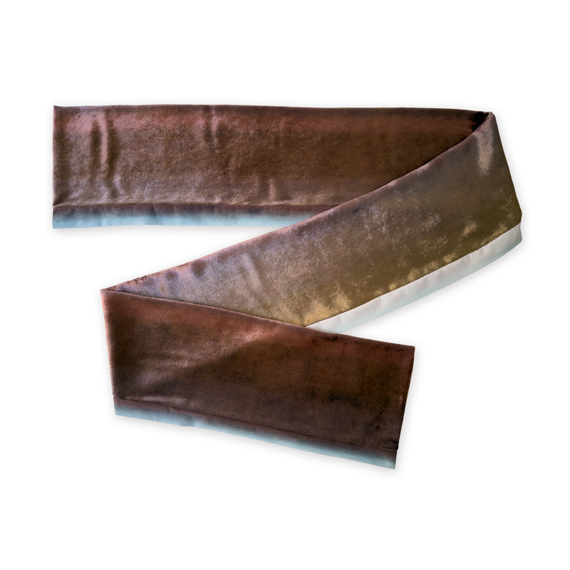 Colorful velvet scarf in brown and blue shades on a white background. t is hand-painted scarf in measures 180 x 18 cm by otta-italy scarves brand. Luxury Italian velvet accessory, soft and warm scarf for women and men.
