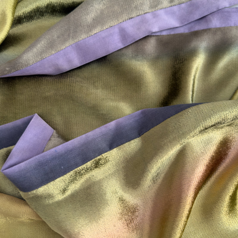 Close-up of fabric. Hand-painted velvet scarf by Otta-Italy, 185 x 20 cm, featuring green, pink and purple colors. Luxury Italian velvet scarf, soft and warm scarf for women and men.
