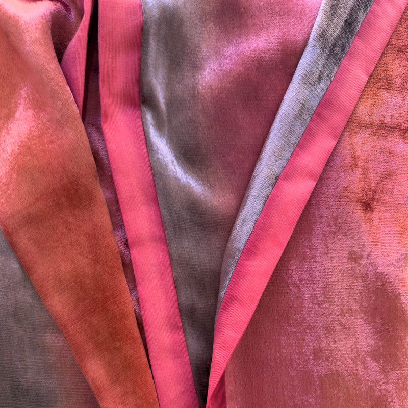 Close-up of fabric. Hand-painted velvet scarf by Otta-Italy, 184 x 17 cm, featuring red and purple colors. Luxury Italian velvet scarf, soft and warm scarf for women and men.
