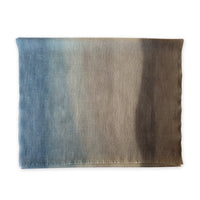 Multicolored wool scarf on a white background. Hand-painted scarf by Otta-Italy, 56 x 177 cm, featuring brown, beige and blue shades of colors. Luxury Italian accessory, soft and warm scarf for women and men.
