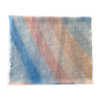 Colorful scarf on a white background. Hand-painted wool scarf by Otta-Italy, 61 x 197 cm, featuring 
pastel blue and pink. Luxury Italian pure wool accessory, soft and warm scarf for women and men.
