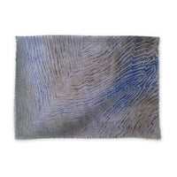 Hand-painted wool silk blend scarf by Otta-Italy on a white background. Blue, light blue and brown luxury accessory.
