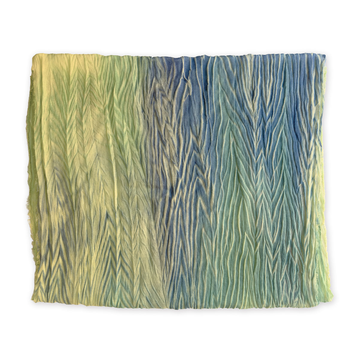 Colorful mix wool and silk scarf in blue, light green and yellow shades on a white background. It is hand-painted scarf in measures 193 x 54 cm by otta-italy scarves brand. Luxury Italian accessory, soft and warm scarf for women and men.
