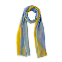 Loosely looped hand-painted Otta wool silk blend scarf on a white background, showcasing its warm texture and length. 70 x 198 cm.

