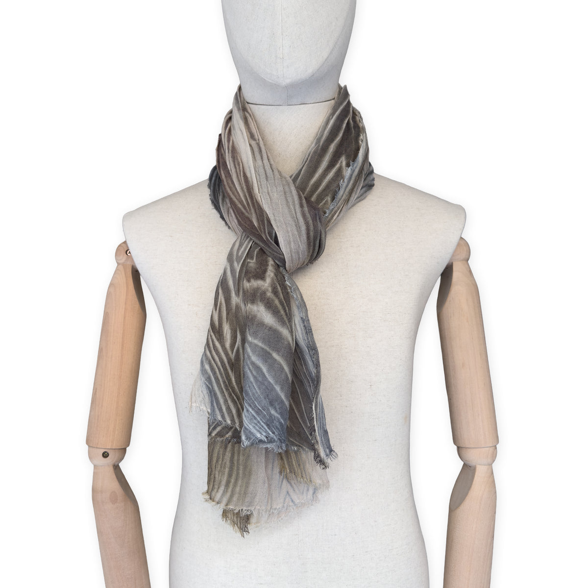 Mannequin wearing scarf on a white background. Hand-painted mix wool and silk scarf by Otta-Italy, 193 x 54 cm, featuring brown, gray and beige colors. Luxury Italian accessory, soft and warm scarf for women and men.
