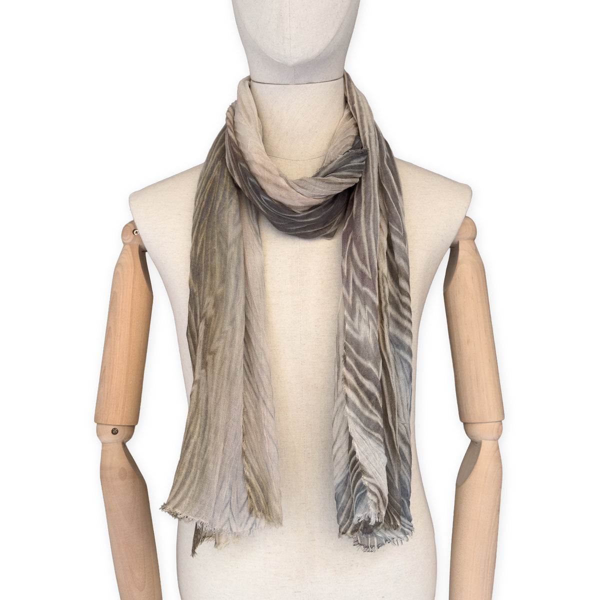 Mannequin wearing scarf on a white background. Hand-painted mix wool and silk scarf by Otta-Italy, 193 x 54 cm, featuring brown, gray and beige colors. Luxury Italian accessory, soft and warm scarf for women and men.
