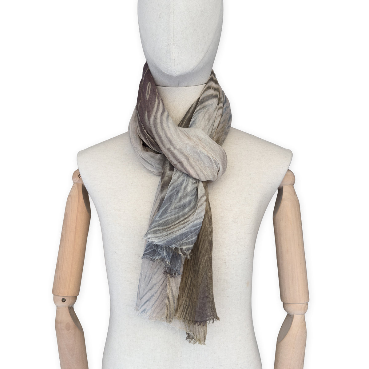 Mannequin wearing scarf on a white background. Hand-painted mix wool and silk scarf by Otta-Italy, 193 x 54 cm, featuring brown, gray and beige colors. Luxury Italian accessory, soft and warm scarf for women and men.
