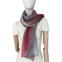 Mannequin wearing scarf on a white background. Hand-painted mix wool and silk scarf by Otta-Italy, 67 x 198 cm, featuring brown, gray and red colors. Luxury Italian accessory, soft and warm scarf for women and men.
