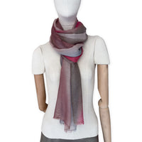 Mannequin wearing scarf on a white background. Hand-painted mix wool and silk scarf by Otta-Italy, 67 x 198 cm, featuring brown, gray and red colors. Luxury Italian accessory, soft and warm scarf for women and men.
