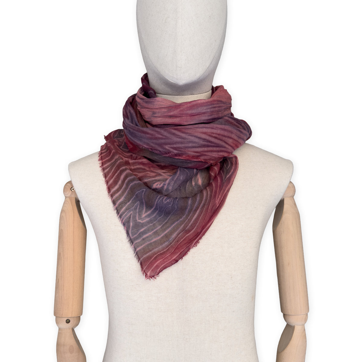 Mannequin wearing scarf on a white background. Hand-painted mix wool and silk scarf by Otta-Italy, 193 x 54 cm, featuring red, purple and dark gray colors. Luxury Italian accessory, soft and warm scarf for women and men.
