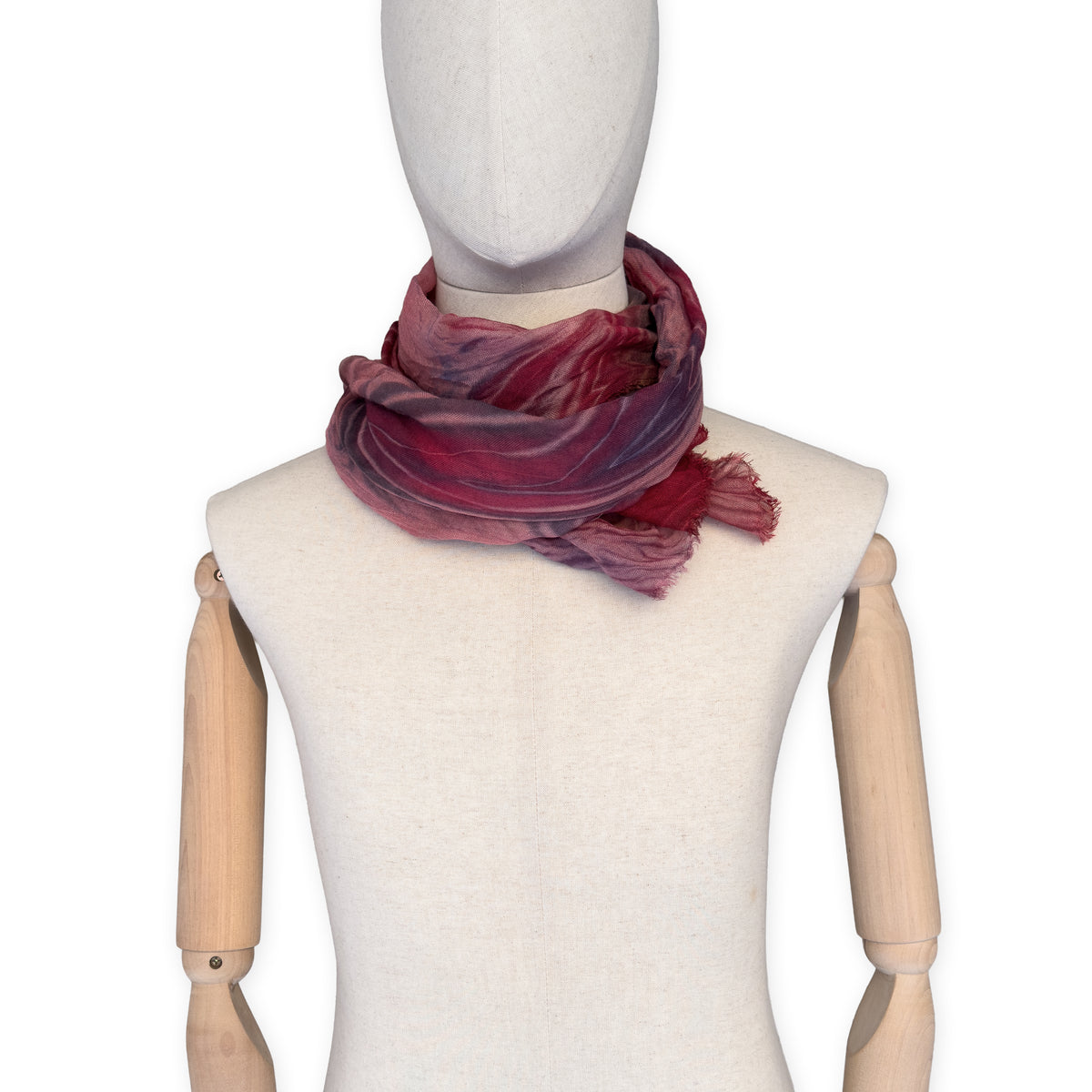 Mannequin wearing scarf on a white background. Hand-painted mix wool and silk scarf by Otta-Italy, 193 x 54 cm, featuring red, purple and dark gray colors. Luxury Italian accessory, soft and warm scarf for women and men.
