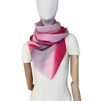 Mannequin wearing scarf on a white background. Hand-painted mix wool and silk scarf by Otta-Italy, 52 x 165 cm, featuring red, pink and gray colors. Luxury Italian accessory, soft and warm scarf for women and men.
