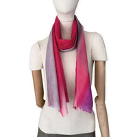 Mannequin wearing scarf on a white background. Hand-painted mix wool and silk scarf by Otta-Italy, 52 x 165 cm, featuring red, pink and gray colors. Luxury Italian accessory, soft and warm scarf for women and men.
